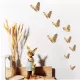 Fémes színű pillangó fal dekoráció
